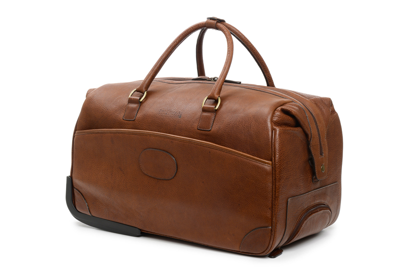 Korchmar's Leather Wheeled Duffle Bag Makes Travel Easy The Primary Mag